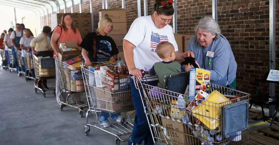 Volunteers distributing food to families